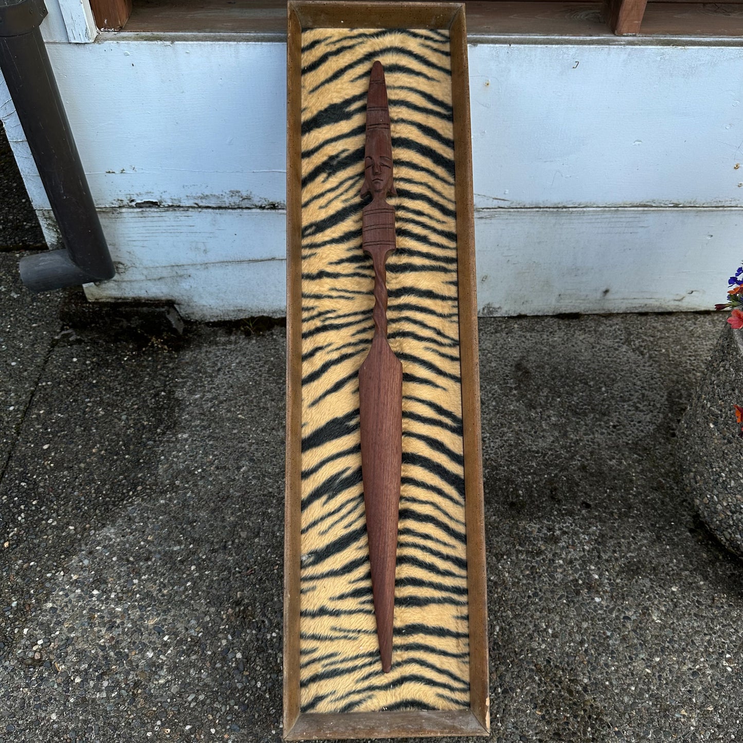 Midcentury African style spear on acrylic tiger fur.