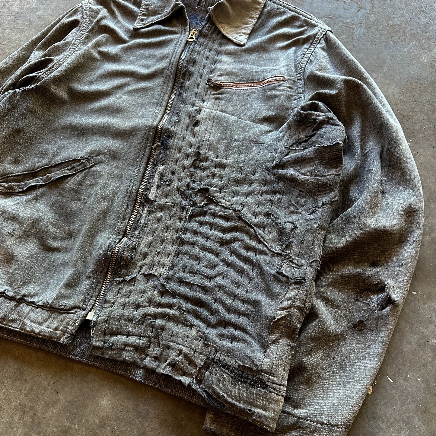 1940’s heavily repaired salt and pepper jacket