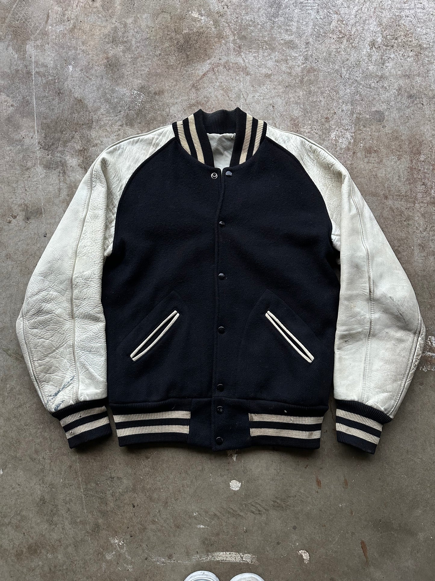 1960’s black and white varsity jacket