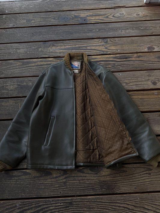 1960’s green vinyl leather clicker jacket