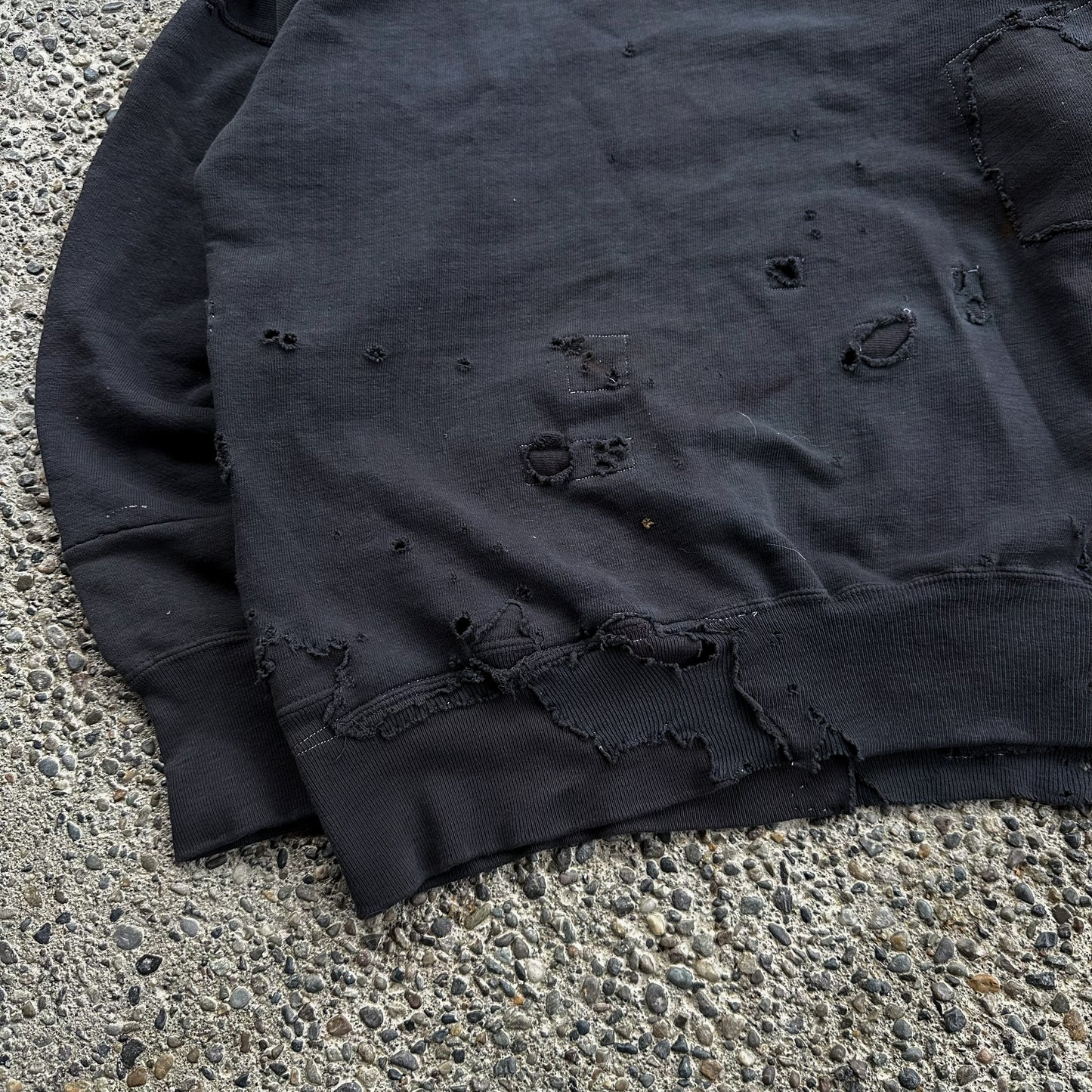 Heavily repaired 1950’s overdyed black hoodie