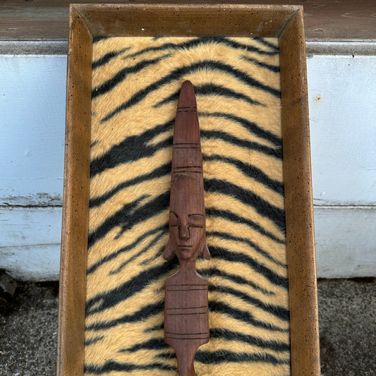 Midcentury African style spear on acrylic tiger fur.